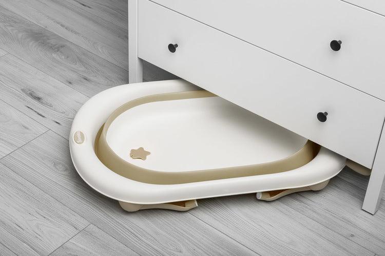 Foldable bathtub for small bathrooms and travels.It folds flat which makes it possible to save a lot of space in the apartment or a car. The bathtub has a classic shape and is decorated with cute deer horns. It can be used from the first days of baby’s life until he/she is ready for a bath in a traditional bath tub. It is made of durable and skin-friendly material. Additionally, the legs of the bathtub are equipped with anti-slip pads which prevent sliding and a blockade against self-folding.