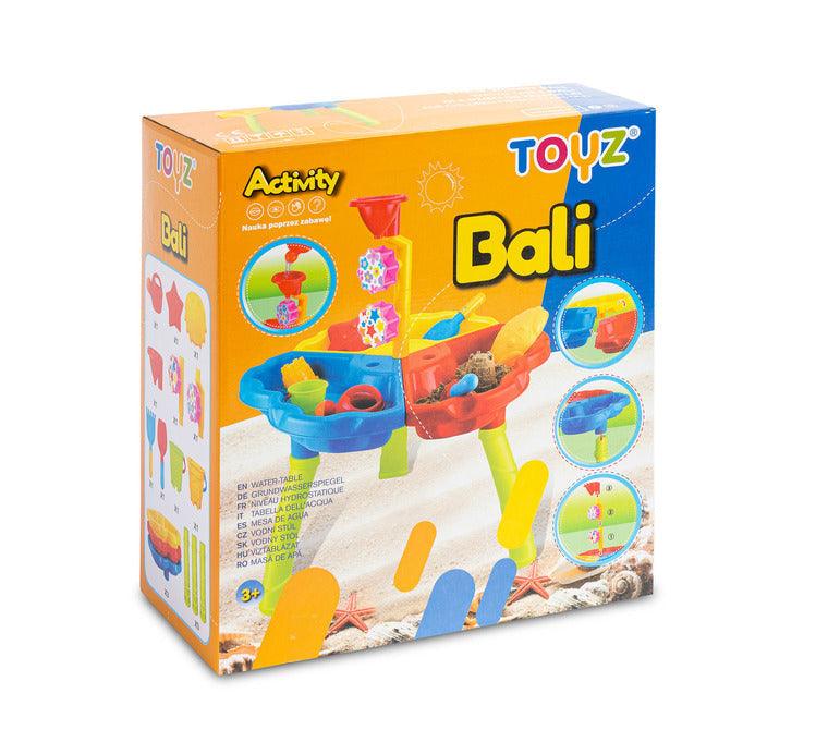 Bali is an educational table from the Toyz Actitivy series, perfect for playing at home, on the balcony or in the garden. Children can develop their curiosity about the world and play with water or sand. A rich set of accessories makes Bali absorb children for long moments. The set includes: 2 large molds (a crab and a star), a spatula and a rake, 2 buckets, a watering can and a tower with reels.