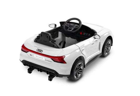 The Audi RS E-Tron GT from Toyz is a unique battery-powered vehicle for children. The design elements of the "adult" model were faithfully reproduced. The V-shaped rear beam of lights, the X-shaped headlamps and the entire body with the dynamic proportions of the GT inspired by sporty dynamics are noteworthy. As befits a real Audi sports car, it has a 4-wheel drive. Comfort and safety of play are ensured by: shock absorbers, EVA foam wheels, eco-leather seat, 3-point belts, slow start and automatic brake.
