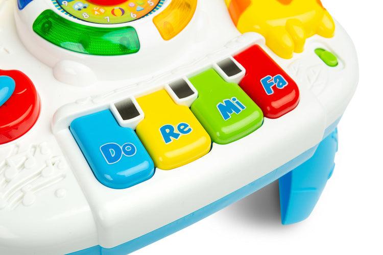 Educational Musical Table from TOYZ is a lot of great fun for every child. The toy is equipped with a loudspeaker that plays many melodies when the child touches its elements.