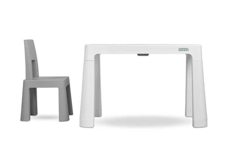 Monti is a versatile children's table with chairs. With its help, you can easily create a corner for artistic work or fun both at home and outdoors. The set is made of high-quality plastic - safe & resistant to various weather whims & wild games. The table & chairs are light, the child can carry them by himself. Thanks to the simple design, Monti can be easily assembled - just press the elements together. The table has 2 drawers that hide under the tabletop, it is also possible to lower the height by 6 cm.