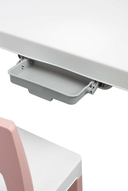 Monti is a versatile children's table with chairs. With its help, you can easily create a corner for artistic work or fun both at home and outdoors. The set is made of high-quality plastic - safe & resistant to various weather whims & wild games. The table & chairs are light, the child can carry them by himself. Thanks to the simple design, Monti can be easily assembled - just press the elements together. The table has 2 drawers that hide under the tabletop, it is also possible to lower the height by 6 cm.