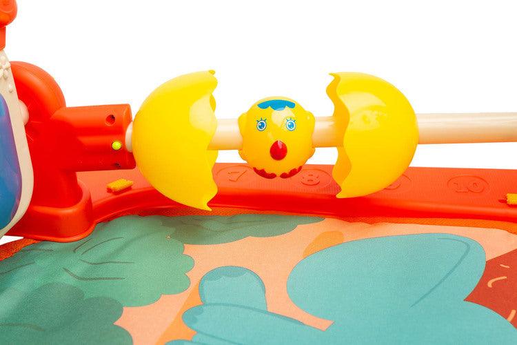 Educational ZOO Mat is a product designed for children who love to play while lying down. The mat is equipped with a headband with rattles in the shape of friendly animals hung on it and a mirror that will delight the baby. A multimedia panel with large buttons will make the fun more enjoyable, and the sensory toys mounted on the sides will help in the child's development. The toy is suitable for children from the first moments of life.