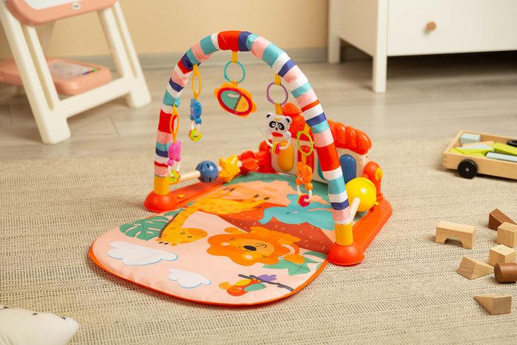 Educational ZOO Mat is a product designed for children who love to play while lying down. The mat is equipped with a headband with rattles in the shape of friendly animals hung on it and a mirror that will delight the baby. A multimedia panel with large buttons will make the fun more enjoyable, and the sensory toys mounted on the sides will help in the child's development. The toy is suitable for children from the first moments of life.