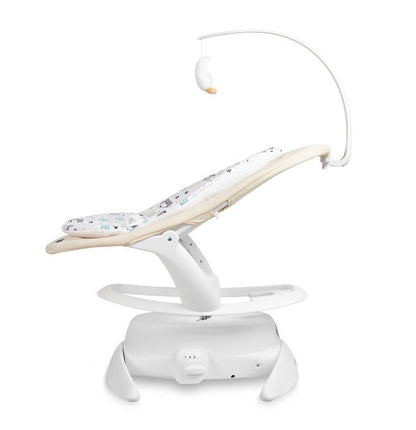 An electric baby rocker Noco featuring a bar and melodies, designed for babies and infants. The rocker have a graphite seat with a patterned fabric, white frame, and a variety of controls and accessories, such as a safety bar and sensory toy.