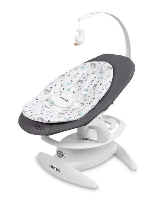 An electric baby rocker Noco featuring a bar and melodies, designed for babies and infants. The rocker have a graphite seat with a patterned fabric, white frame, and a variety of controls and accessories, such as a safety bar and sensory toy.