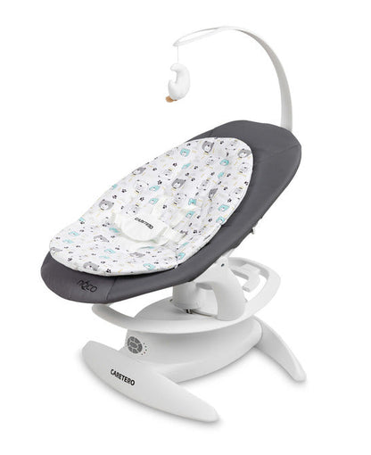 An electric baby rocker Noco featuring a bar and melodies, designed for babies and infants. The rocker have a graphite seat with a patterned fabric, white frame, and a variety of controls and accessories, such as a safety bar and sensory toy.
