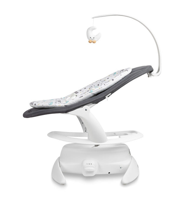 An electric baby rocker Noco featuring a bar and melodies, designed for babies and infants. The rocker have a graphite seat with a patterned fabric, white frame, and a variety of controls and accessories, such as a safety bar and sensory toy.