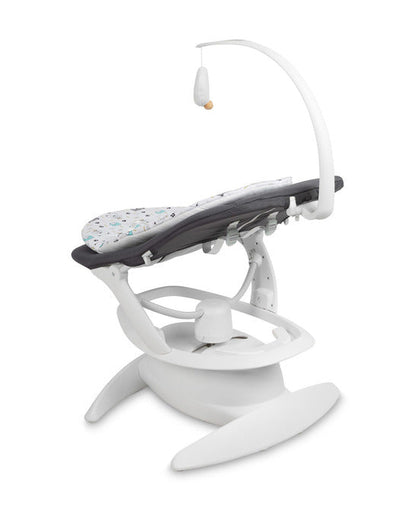 An electric baby rocker Noco featuring a bar and melodies, designed for babies and infants. The rocker have a graphite seat with a patterned fabric, white frame, and a variety of controls and accessories, such as a safety bar and sensory toy.