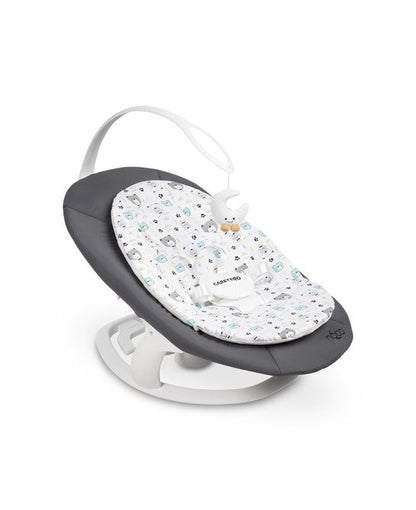 An electric baby rocker Noco featuring a bar and melodies, designed for babies and infants. The rocker have a graphite seat with a patterned fabric, white frame, and a variety of controls and accessories, such as a safety bar and sensory toy.