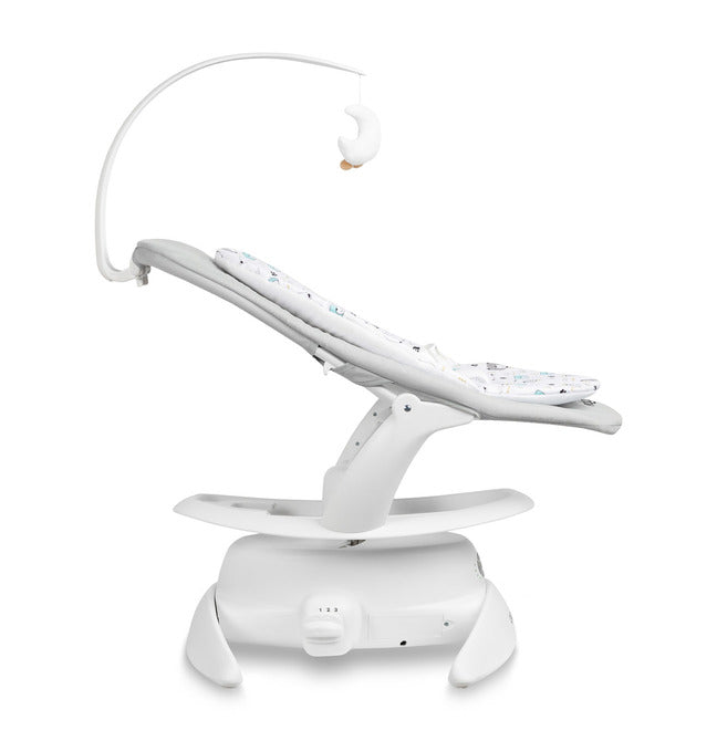 An electric baby rocker Noco featuring a bar and melodies, designed for babies and infants. The rocker have a graphite seat with a patterned fabric, white frame, and a variety of controls and accessories, such as a safety bar and sensory toy.