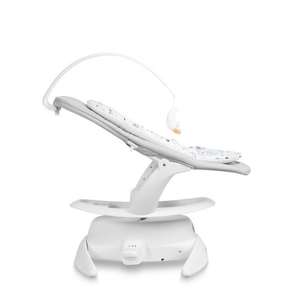 An electric baby rocker Noco featuring a bar and melodies, designed for babies and infants. The rocker have a graphite seat with a patterned fabric, white frame, and a variety of controls and accessories, such as a safety bar and sensory toy.