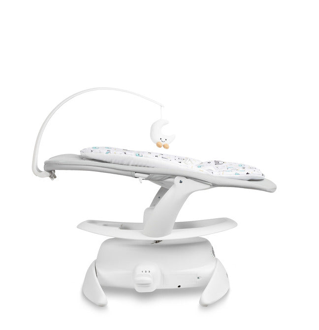 An electric baby rocker Noco featuring a bar and melodies, designed for babies and infants. The rocker have a graphite seat with a patterned fabric, white frame, and a variety of controls and accessories, such as a safety bar and sensory toy.