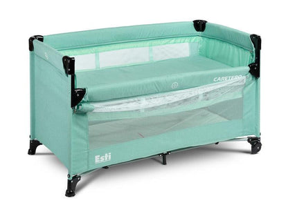 The Esti cot is a travel cot designed to facilitate the care of babies. Its biggest advantage is the foldable side, which transforms the cot into an extra bed and provides more comfortable access to the child. The practical folding mechanism means that folding or unfolding takes only a moment. The cot also has wheels with a blockade for easy portability. The side door closed with a zipper will allow older children to safely enter the cot, which can be used as a playpen.