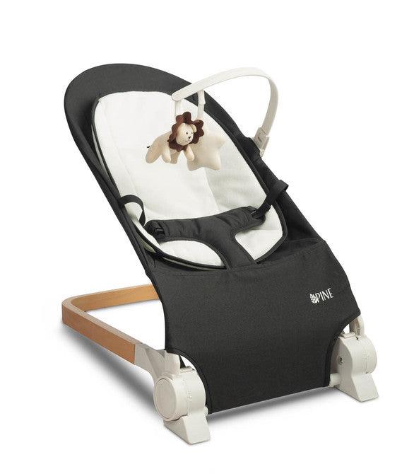 PINE from Caretero is a practical children's lounger that will be useful during everyday child care. The comfortable backrest can be adjusted to three inclination positions. The lounger is equipped with a headband with plush toys that will occupy the child's attention. A soft, removable insert will improve the baby's comfort, and the straps will ensure safety during use. The elegant wooden base is a stylish accent that fits perfectly into the decor of a children's room.