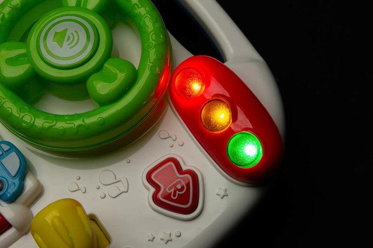 The Little Racers Drive's Table is a delightful educational toy from TOYZ that will provide your child with hours of great fun. The table is equipped with buttons and lights that harmonize with the loudspeaker emitting pleasant melodies and car sounds.