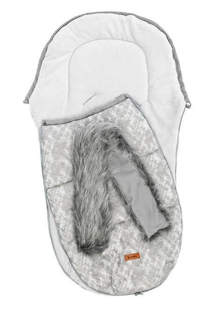 Olaf romper bag is perfect for walks in colder temperatures. It combines a waterproof, easy to keep clean outer layer and soft polar fleece on the inside. Thanks to a fluffy, anti-allergic non-woven fabric it provides effective protection and comfort of a baby. Stylish patterns make the bag exceptional, and artificial fur by the hood with the option of unfastening make it look unique. The romper bag fits pushchairs of any style. It can be used in prams, strollers, and for sledges.