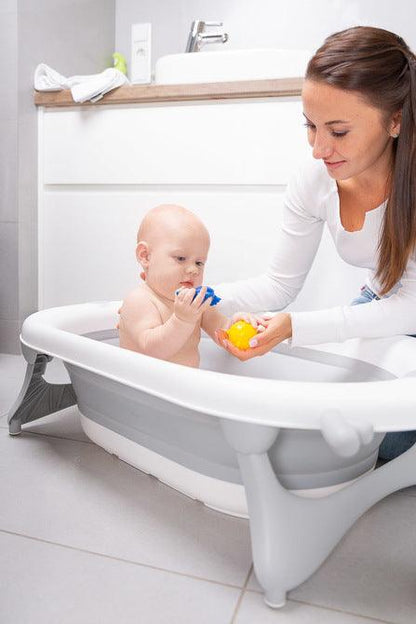 Foldable bathtub for small bathrooms and travels.It folds flat which makes it possible to save a lot of space in the apartment or a car.  The bathtub has a classic shape and is decorated with cute deer horns. It can be used from the first days of baby’s life until he/she is ready for a bath in a traditional bath tub. It is made of durable and skin-friendly material. Additionally, the legs of the bathtub are equipped with anti-slip pads which prevent sliding and a blockade against self-folding.