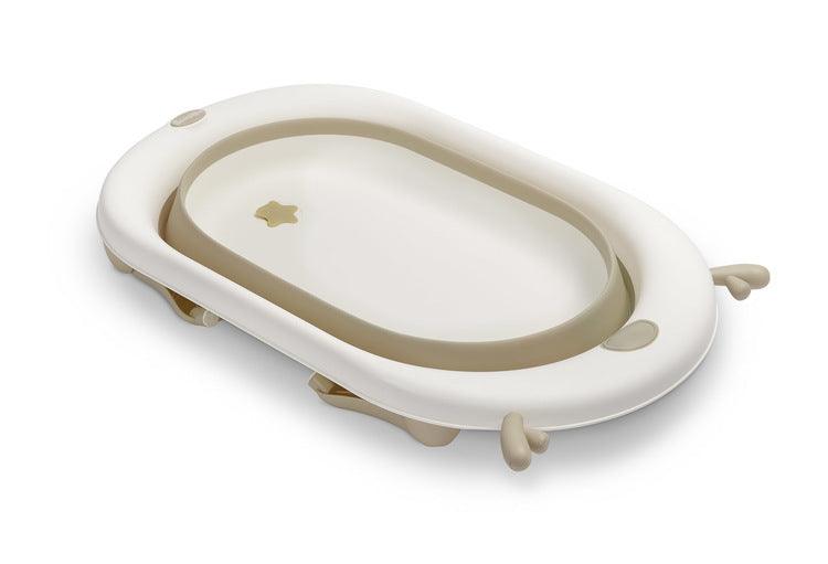 Foldable bathtub for small bathrooms and travels.It folds flat which makes it possible to save a lot of space in the apartment or a car.  The bathtub has a classic shape and is decorated with cute deer horns. It can be used from the first days of baby’s life until he/she is ready for a bath in a traditional bath tub. It is made of durable and skin-friendly material. Additionally, the legs of the bathtub are equipped with anti-slip pads which prevent sliding and a blockade against self-folding.