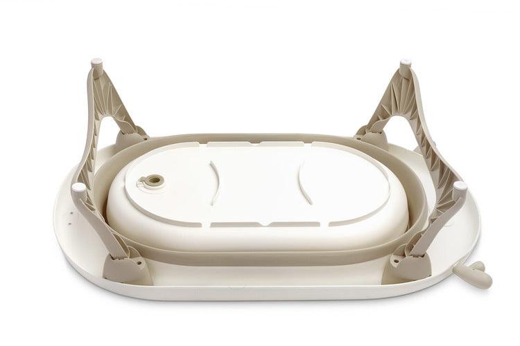 Foldable bathtub for small bathrooms and travels.It folds flat which makes it possible to save a lot of space in the apartment or a car.  The bathtub has a classic shape and is decorated with cute deer horns. It can be used from the first days of baby’s life until he/she is ready for a bath in a traditional bath tub. It is made of durable and skin-friendly material. Additionally, the legs of the bathtub are equipped with anti-slip pads which prevent sliding and a blockade against self-folding.