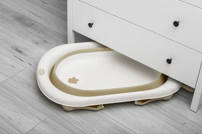 Foldable bathtub for small bathrooms and travels.It folds flat which makes it possible to save a lot of space in the apartment or a car.  The bathtub has a classic shape and is decorated with cute deer horns. It can be used from the first days of baby’s life until he/she is ready for a bath in a traditional bath tub. It is made of durable and skin-friendly material. Additionally, the legs of the bathtub are equipped with anti-slip pads which prevent sliding and a blockade against self-folding.