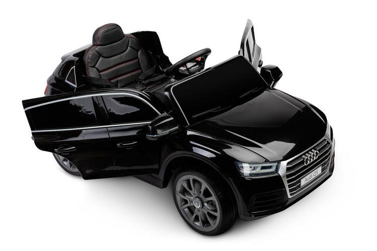 The Audi Q5 is a licensed battery vehicle that combines the comfort of an SUV with the sportiness of the Audi brand. The comfort of play is increased by a comfortable eco-leather seat, 5-point seat belts, EVA foam wheels and shock absorbers. Q5 is powered by 2 dynamic 35W motors and a 7Ah battery, which guarantees a long ride.The time spent behind the wheel will be made more pleasant by the multimedia panel with built-in melodies and AUX (mini jack) and USB (mp3 files) inputs.