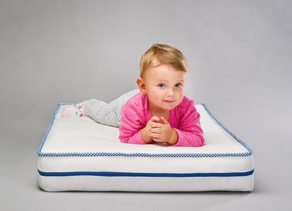 LATEX-FOAM MATTRESS 120x60 cm, a reversible mattress for the youngest. The latex mat is highly valued due to high degree of flexibility. It perfectly fits the natural curvatures of the body, ensuring proper support for the spine. Classical polyurethane foam provides proper hardness of the bed during the first months of the child's life. A delicate in touch, detachable case simplifies the maintenance. The mattress has a medical device certificate.