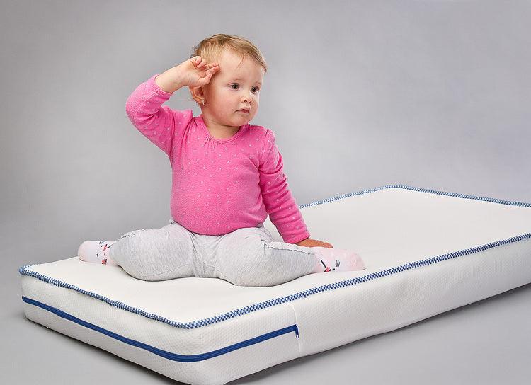 LATEX-FOAM MATTRESS 120x60 cm, a reversible mattress for the youngest. The latex mat is highly valued due to high degree of flexibility. It perfectly fits the natural curvatures of the body, ensuring proper support for the spine. Classical polyurethane foam provides proper hardness of the bed during the first months of the child's life. A delicate in touch, detachable case simplifies the maintenance. The mattress has a medical device certificate.