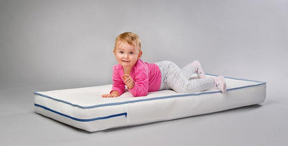 LATEX-FOAM MATTRESS 120x60 cm, a reversible mattress for the youngest. The latex mat is highly valued due to high degree of flexibility. It perfectly fits the natural curvatures of the body, ensuring proper support for the spine. Classical polyurethane foam provides proper hardness of the bed during the first months of the child's life. A delicate in touch, detachable case simplifies the maintenance. The mattress has a medical device certificate.