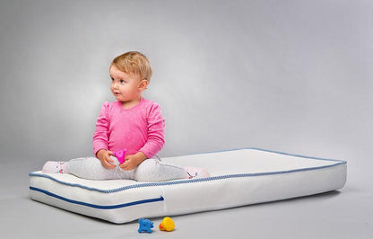 LATEX-FOAM MATTRESS 120x60 cm, a reversible mattress for the youngest. The latex mat is highly valued due to high degree of flexibility. It perfectly fits the natural curvatures of the body, ensuring proper support for the spine. Classical polyurethane foam provides proper hardness of the bed during the first months of the child's life. A delicate in touch, detachable case simplifies the maintenance. The mattress has a medical device certificate.