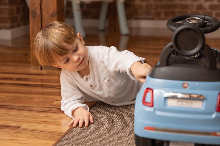 The Fiat 500 children's ride-on car from Toyz combines the charm of Italian design with high-quality workmanship. It will help in learning to move independently and will be a lot of fun while having fun. The vehicle has a realistic steering wheel with two buttons that make sounds. There is a toy compartment under the seat.