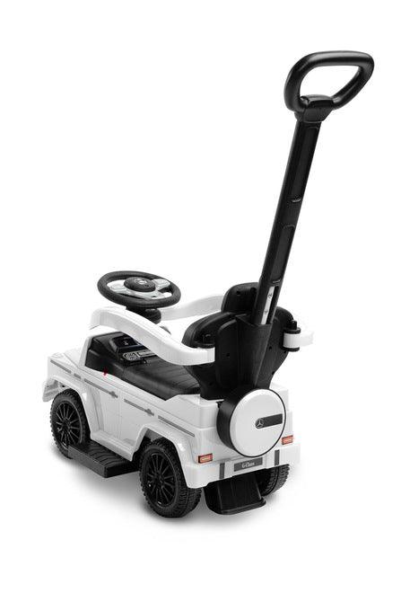 The Mercedes G 350 D vehicle from Toyz is a licensed ride-on, walker and pusher in one. Its appearance reflects the appearance of the cult G-class cars. Using the opening barriers, retractable footrests and a handle to guide the vehicle, it becomes a pusher designed for the youngest children. By disassembling individual elements, the parent can quickly transform it into a ride-on for the child to move on his own. Driving a Mercedes will be diversified by a steering wheel with sound effects.