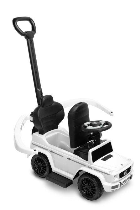 The Mercedes G 350 D vehicle from Toyz is a licensed ride-on, walker and pusher in one. Its appearance reflects the appearance of the cult G-class cars. Using the opening barriers, retractable footrests and a handle to guide the vehicle, it becomes a pusher designed for the youngest children. By disassembling individual elements, the parent can quickly transform it into a ride-on for the child to move on his own. Driving a Mercedes will be diversified by a steering wheel with sound effects.