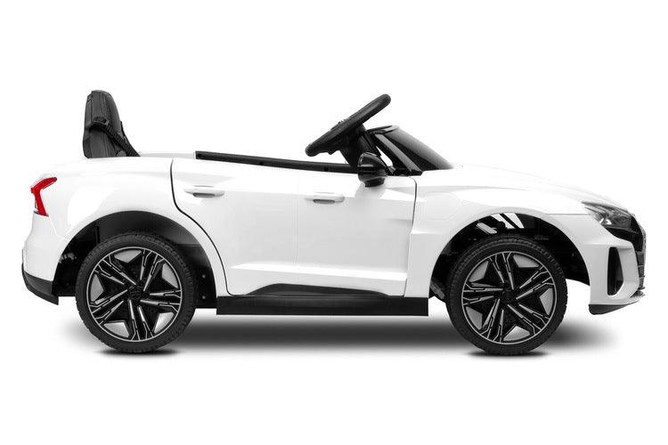 The Audi RS E-Tron GT from Toyz is a unique battery-powered vehicle for children. The design elements of the "adult" model were faithfully reproduced. The V-shaped rear beam of lights, the X-shaped headlamps and the entire body with the dynamic proportions of the GT inspired by sporty dynamics are noteworthy. As befits a real Audi sports car, it has a 4-wheel drive. Comfort and safety of play are ensured by: shock absorbers, EVA foam wheels, eco-leather seat, 3-point belts, slow start and automatic brake.
