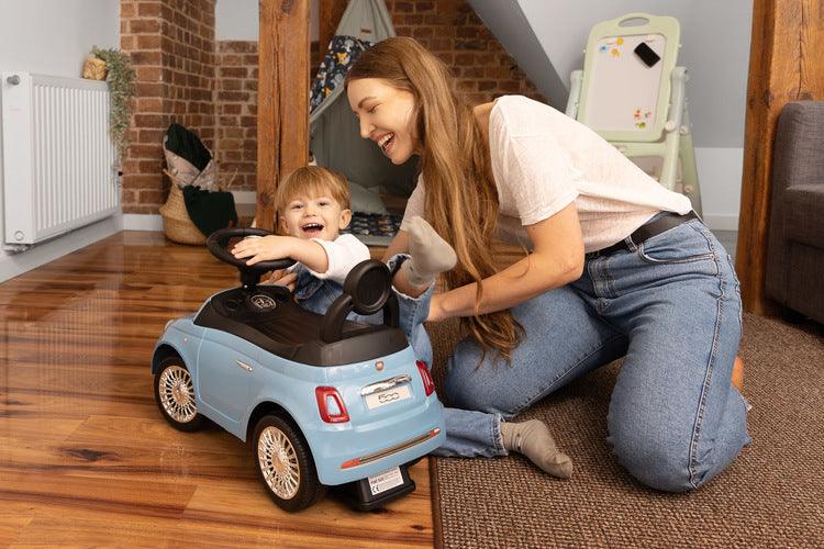 The Fiat 500 children's ride-on car from Toyz combines the charm of Italian design with high-quality workmanship. It will help in learning to move independently and will be a lot of fun while having fun. The vehicle has a realistic steering wheel with two buttons that make sounds. There is a toy compartment under the seat.