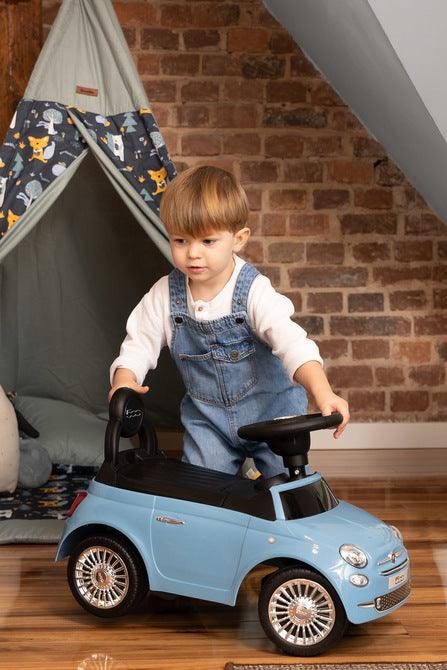 The Fiat 500 children's ride-on car from Toyz combines the charm of Italian design with high-quality workmanship. It will help in learning to move independently and will be a lot of fun while having fun. The vehicle has a realistic steering wheel with two buttons that make sounds. There is a toy compartment under the seat.