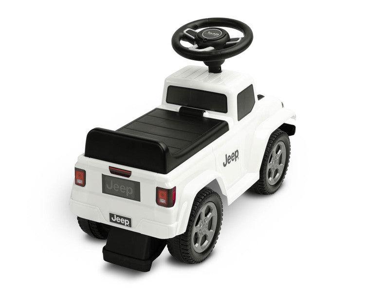 The Jeep Rubicon children's ride by Toyz combines off-road design and high quality workmanship. It will help in learning to move independently and will give a lot of fun while playing. The ride-on has a steering wheel with two sound-producing buttons. Under the seat there is a storage for toys.