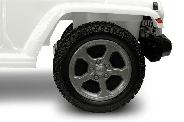 The Jeep Rubicon children's ride by Toyz combines off-road design and high quality workmanship. It will help in learning to move independently and will give a lot of fun while playing. The ride-on has a steering wheel with two sound-producing buttons. Under the seat there is a storage for toys.