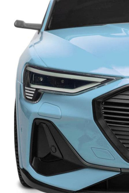 Audi E-tron Sportback is a Toyz licensed battery car that combines elegant design with the dynamism of an electric drive. Modern narrow mirrors and a combined rear light beam. The inner strength of the E-tron Sportback is the all-wheel drive with 45 W motors. They are powered by a 7 Ah battery. Comfort and safety of play are ensured by rear shock absorbers, EVA foam wheels, eco-leather seat, 3-point belts, slow start, two speed modes and an automatic brake.