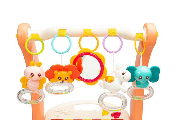 A walker with a 2-in-1 music mat is a colorful toy for babies who are taking their first steps. The mat is equipped with a headband with rattles in the shape of friendly animals hung on it and a mirror that will delight the baby. After loosening the front wheels and detaching the mat, the child can easily guide his pusher. A multimedia panel with large buttons will make the fun more enjoyable, and the sensory toys mounted on the sides will help in the child's development.