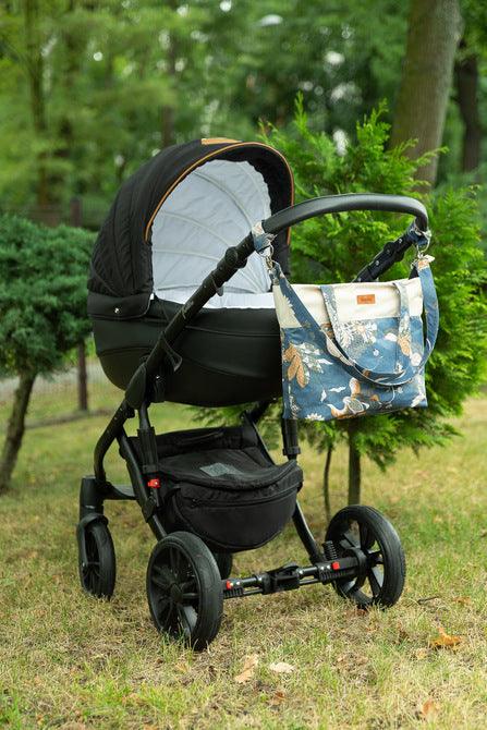 The Velvet stroller bag will meet the requirements of an active mother, it is roomy and fits modern prams. Made of excellent materials with the utmost attention to detail. The spacious interior will allow you to fit all the accessories necessary during a walk. In the middle it has a compartment that helps to organize accessories so that they can be easily found and 2 pockets. Equipped with shoulder straps, one long strap and two handles that allow you to attach the bag to the handle of the trolley.