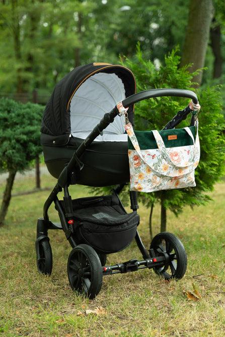 The Velvet stroller bag will meet the requirements of an active mother, it is roomy and fits modern prams. Made of excellent materials with the utmost attention to detail. The spacious interior will allow you to fit all the accessories necessary during a walk. In the middle it has a compartment that helps to organize accessories so that they can be easily found and 2 pockets. Equipped with shoulder straps, one long strap and two handles that allow you to attach the bag to the handle of the trolley.