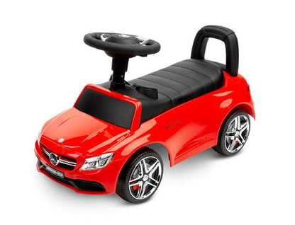 The Mercedes AMG C63 from TOYZ is a real treat for little ones. The Mercedes brand license guarantees a realistic look and great attention to detail. It has a steering wheel with horn and melodies, and there is a storage space under the seat. The child has a great time using the ride-on toy and develops its motor coordination.