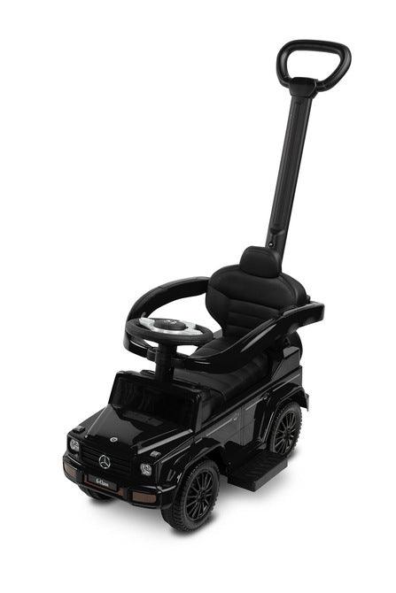 The Mercedes G 350 D vehicle from Toyz is a licensed ride-on, walker and pusher in one. Its appearance reflects the appearance of the cult G-class cars. Using the opening barriers, retractable footrests and a handle to guide the vehicle, it becomes a pusher designed for the youngest children. By disassembling individual elements, the parent can quickly transform it into a ride-on for the child to move on his own. Driving a Mercedes will be diversified by a steering wheel with sound effects.