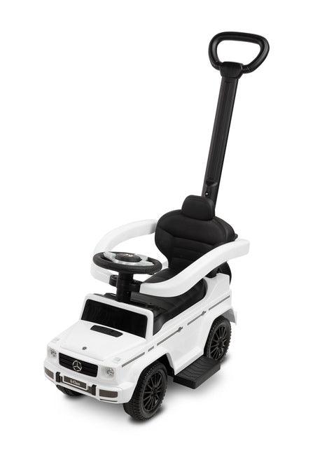 The Mercedes G 350 D vehicle from Toyz is a licensed ride-on, walker and pusher in one. Its appearance reflects the appearance of the cult G-class cars. Using the opening barriers, retractable footrests and a handle to guide the vehicle, it becomes a pusher designed for the youngest children. By disassembling individual elements, the parent can quickly transform it into a ride-on for the child to move on his own. Driving a Mercedes will be diversified by a steering wheel with sound effects.