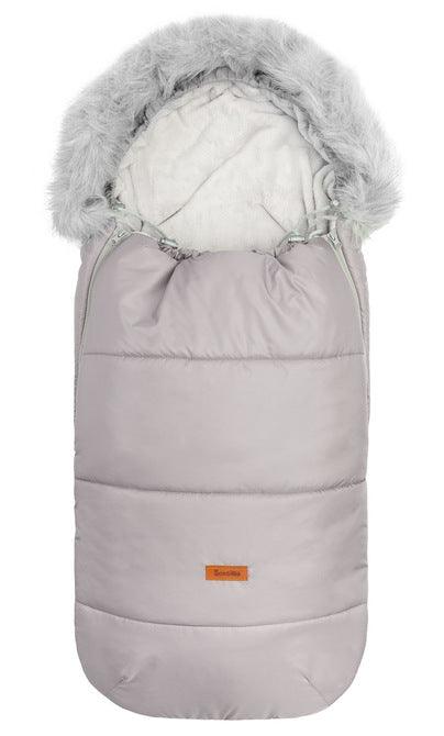 Orso romper bag has a waterproof, easy to keep clean over layer with aesthetic quilting. On the inside there is a layer of soft polar fleece. The layer of fluffy, anti-allergic nonwoven fabric provides effective protection and comfort. Artificial fur by the hood that can be unfastened makes it look exceptional. The romper bag fits pushchairs of any style. It can be used in prams, strollers, and for sledges. It has holes for belts and a zip at the entire length.