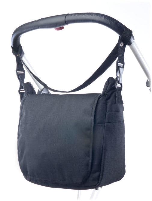 A capacious and solid mama bag made of safe materials. Multiple compartments, pockets and rubber bands help in organizing all accessories necessary during a stroll with your baby. The velcro-closed flap allows quick and easy access to the most important items. The included shoulder strap can be snapped onto the strollers handle for even more convenience.