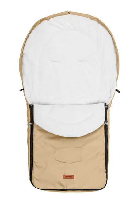 Multi-layered and universal romper bag, prepared for walks on colder days. The baby will feel safe and comfortable in it and his/her soft skin will not be exposed to irritation. The romper bag is covered with waterproof, attested fabric on the outside. From the inside, there is a warm and nice in touch polar fleece. There is an additional layer of batting between them.